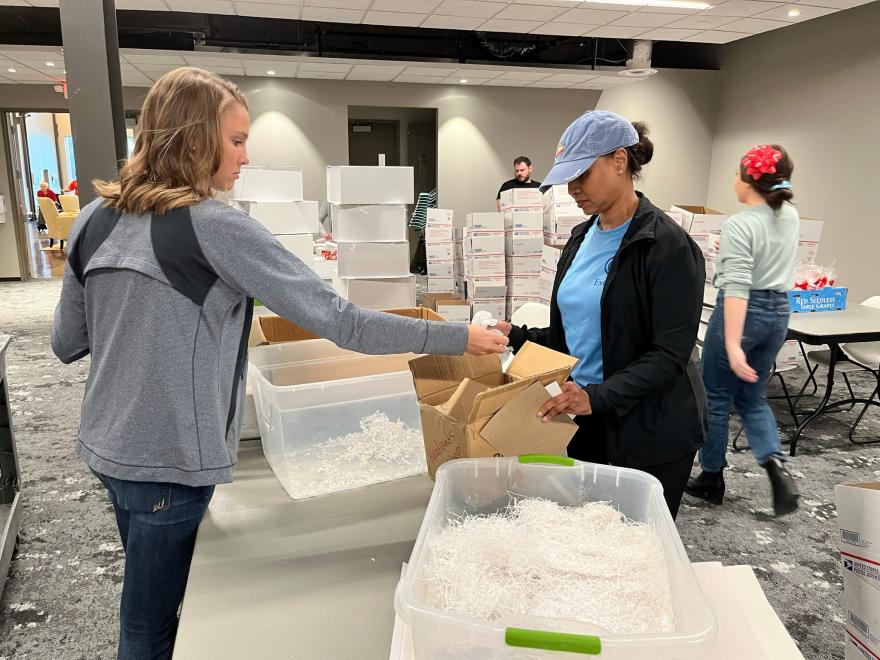 Kirby Richards (L) and Leslie Smith (R) help package Brookwood special orders.