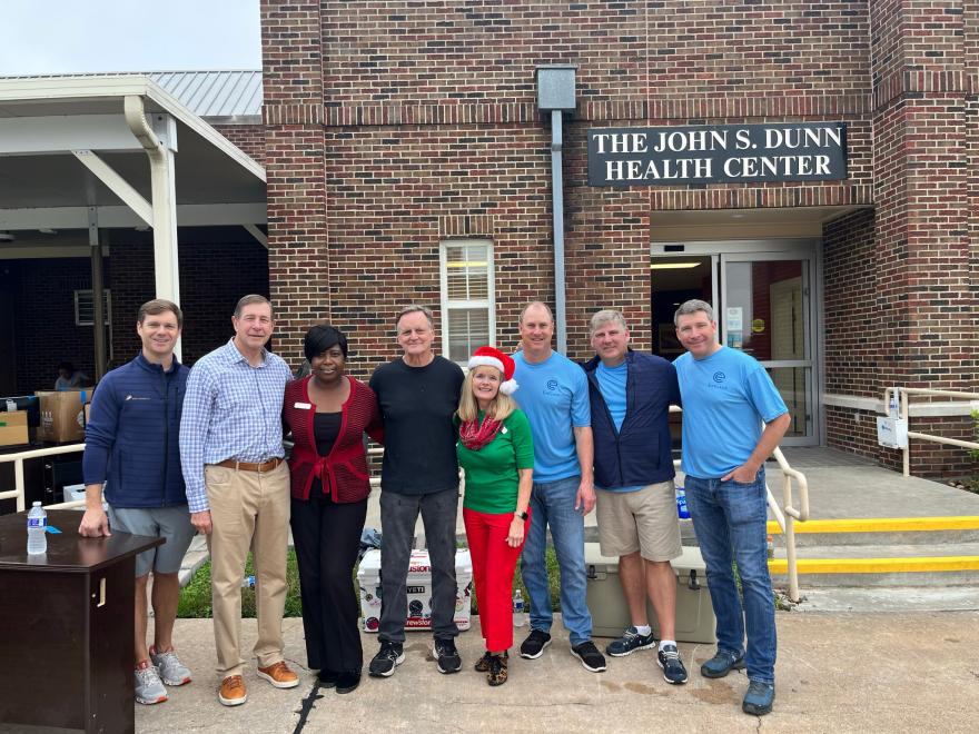 EnCap Partners pictured with Brookwood employees in front of the previous medical center building, the John S. Dunn Health Center.